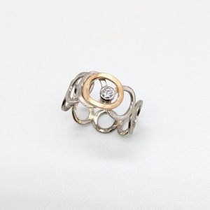 Foto von 585er Weißgold- Roségoldring mit einem Brillanten