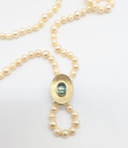 Foto von Perlkette mit Clip aus 585er Gelbgold mit Turmalincabochon